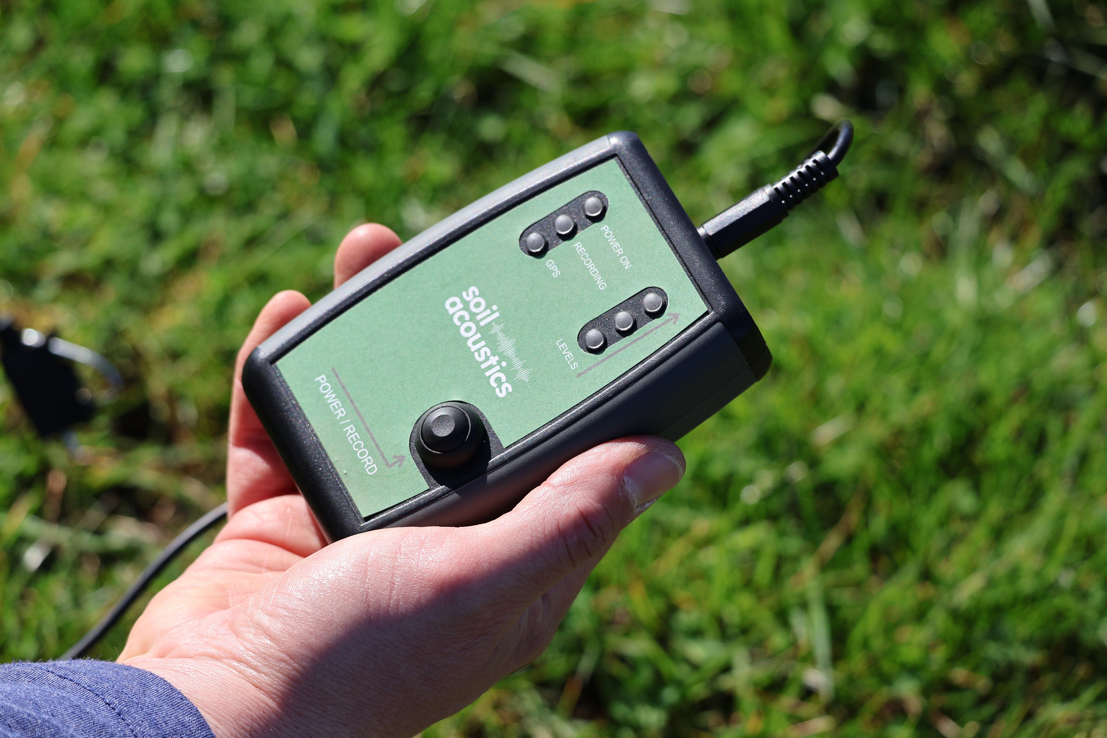 Soil Acoustic Meter in hand before recording